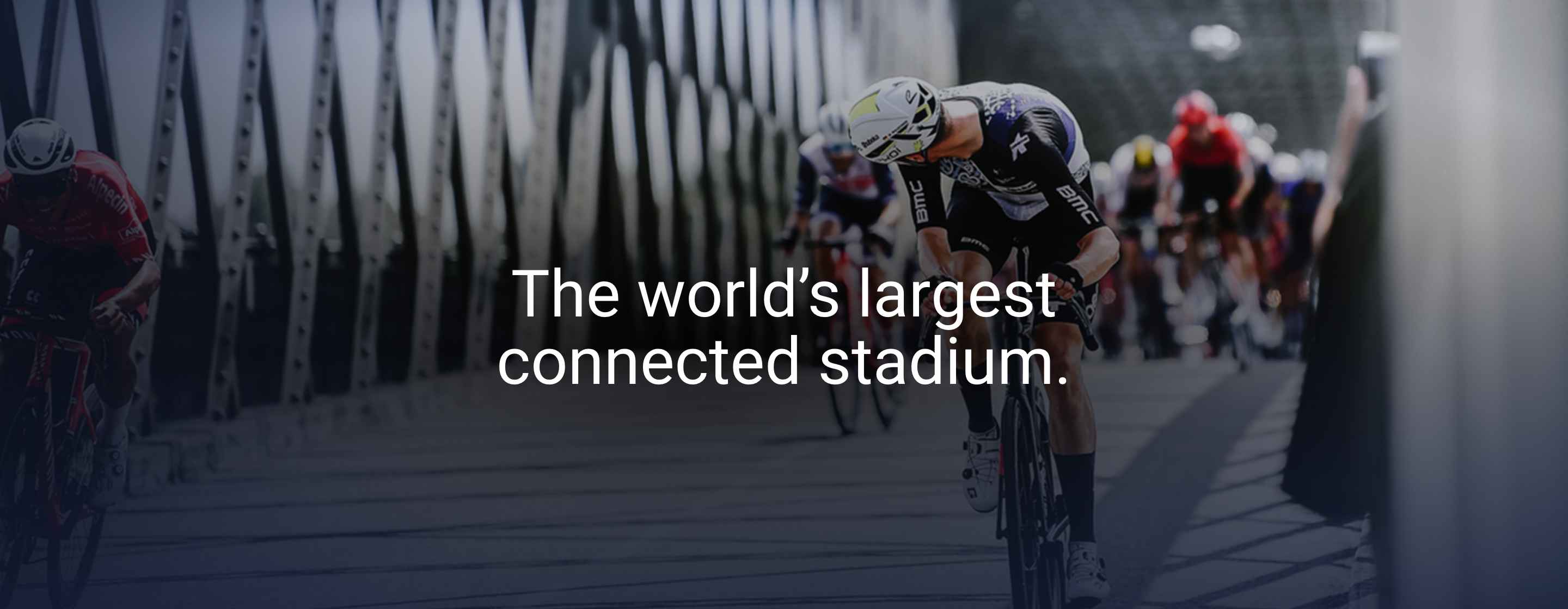 Cyclist racing through a bridge