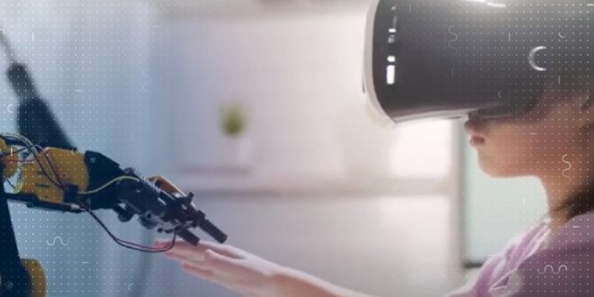 Girl wearing VR headset reaching out to a mechanical hand