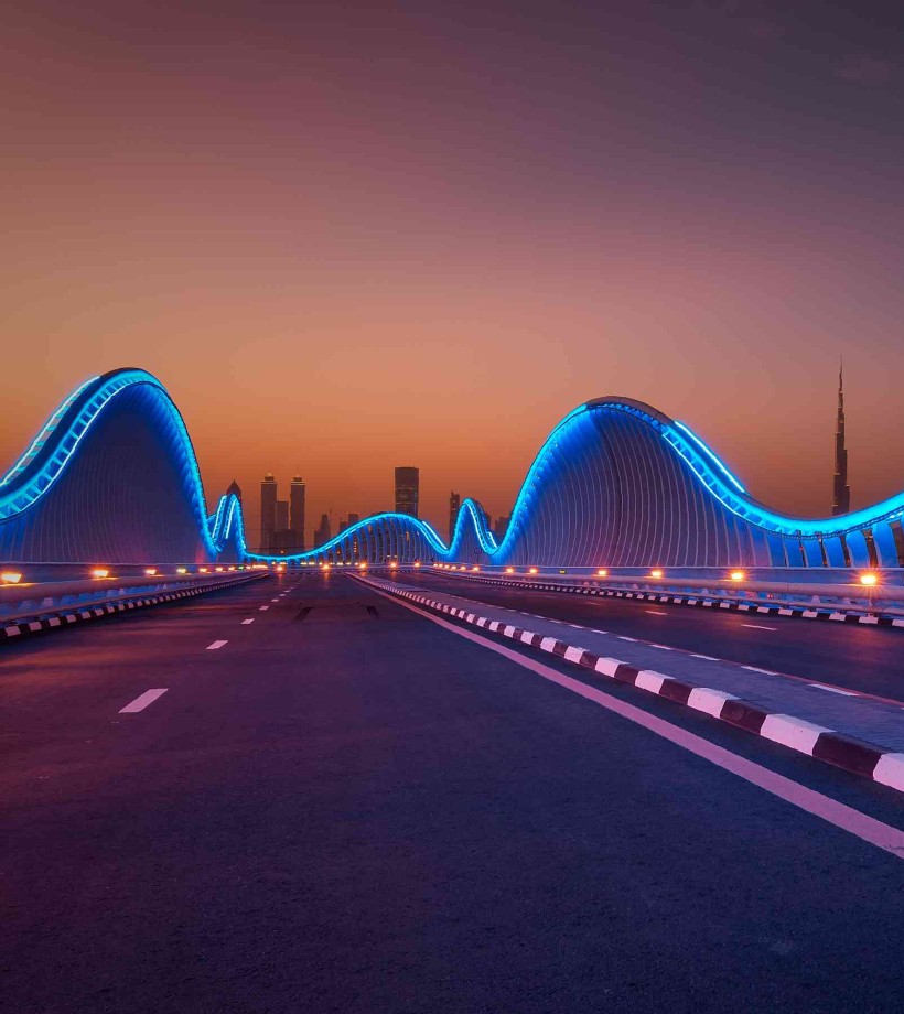 A view of a bridge with lights at night