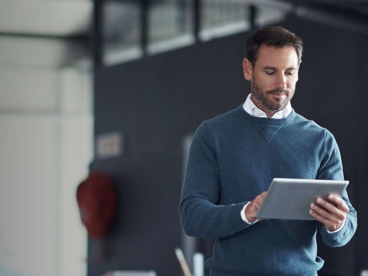 Man holding an ipad
