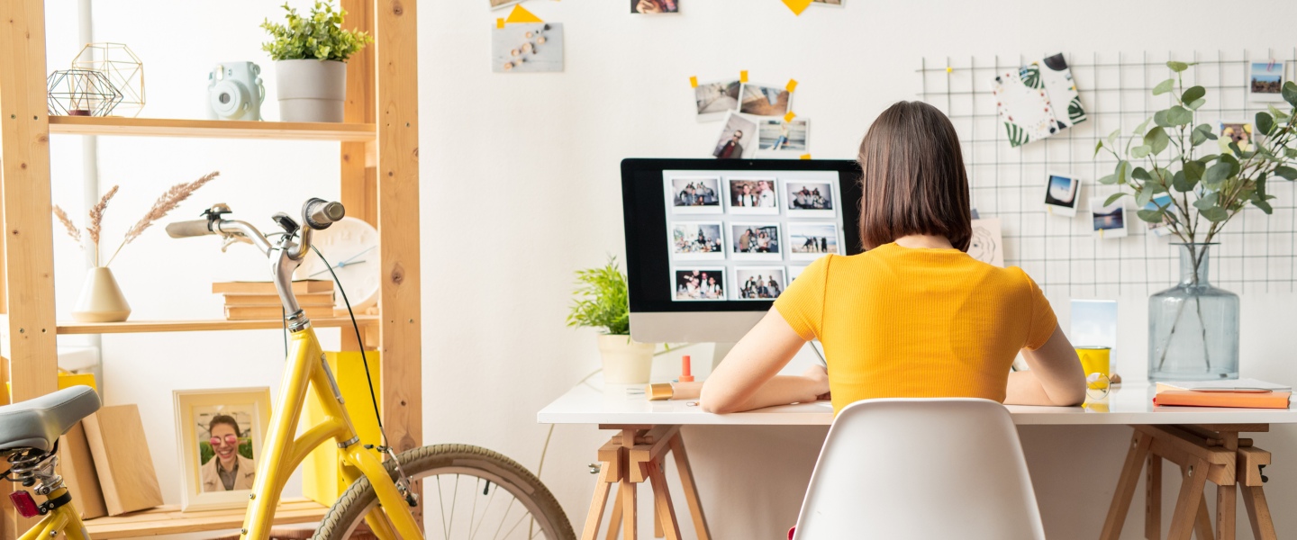 A woman working at her desk from home